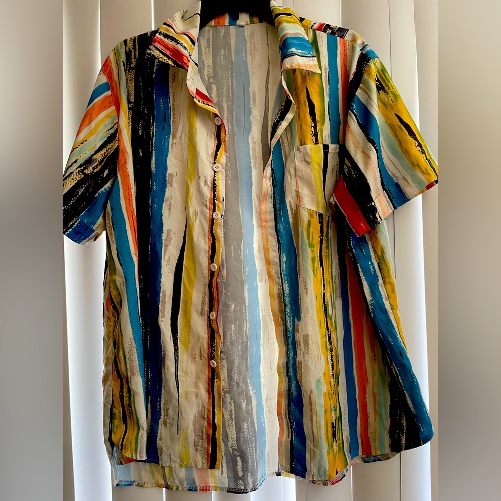 Colorful striped shirt, buttons up. No brand as far as I can tell. Size large.
